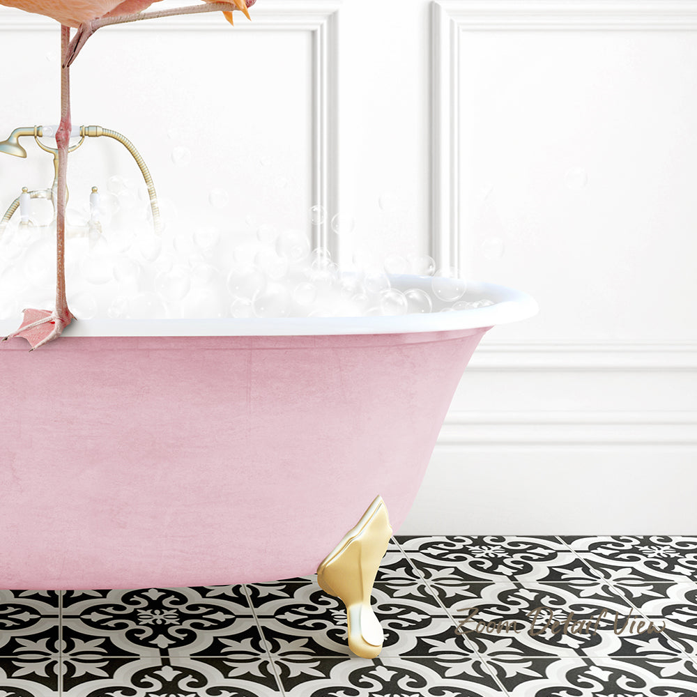 A pink clawfoot bathtub filled with water and bubbles, with a gold clawfoot footrest and a black and white patterned floor.