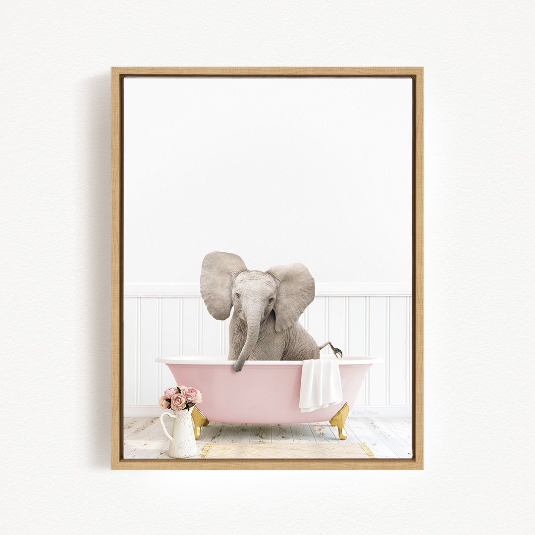 A gray elephant sitting in a pink bathtub, surrounded by flowers and a white vase.