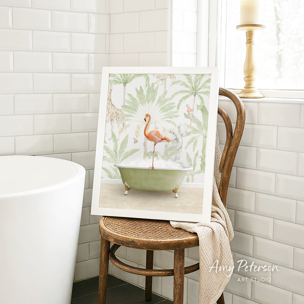 A framed painting of a flamingo standing in a bathtub is displayed on a wooden chair in a bathroom setting.