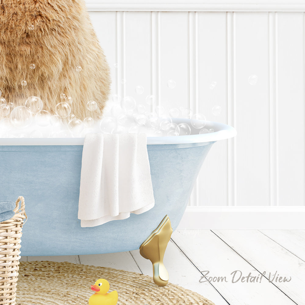 A fluffy brown cat is sitting in a blue bathtub filled with bubbles, surrounded by a yellow rubber duck and a white towel.