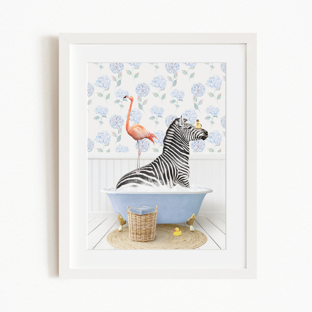 A zebra is sitting in a blue bathtub, with a pink flamingo standing on its back and a basket of yellow rubber ducks nearby.