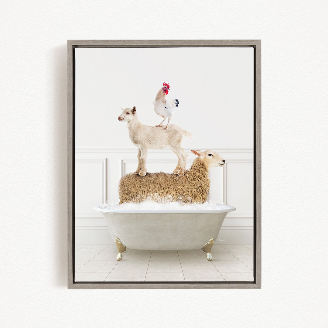 A framed image depicting a goat standing on top of a sheep in a bathtub, with a rooster perched on the sheep's back.