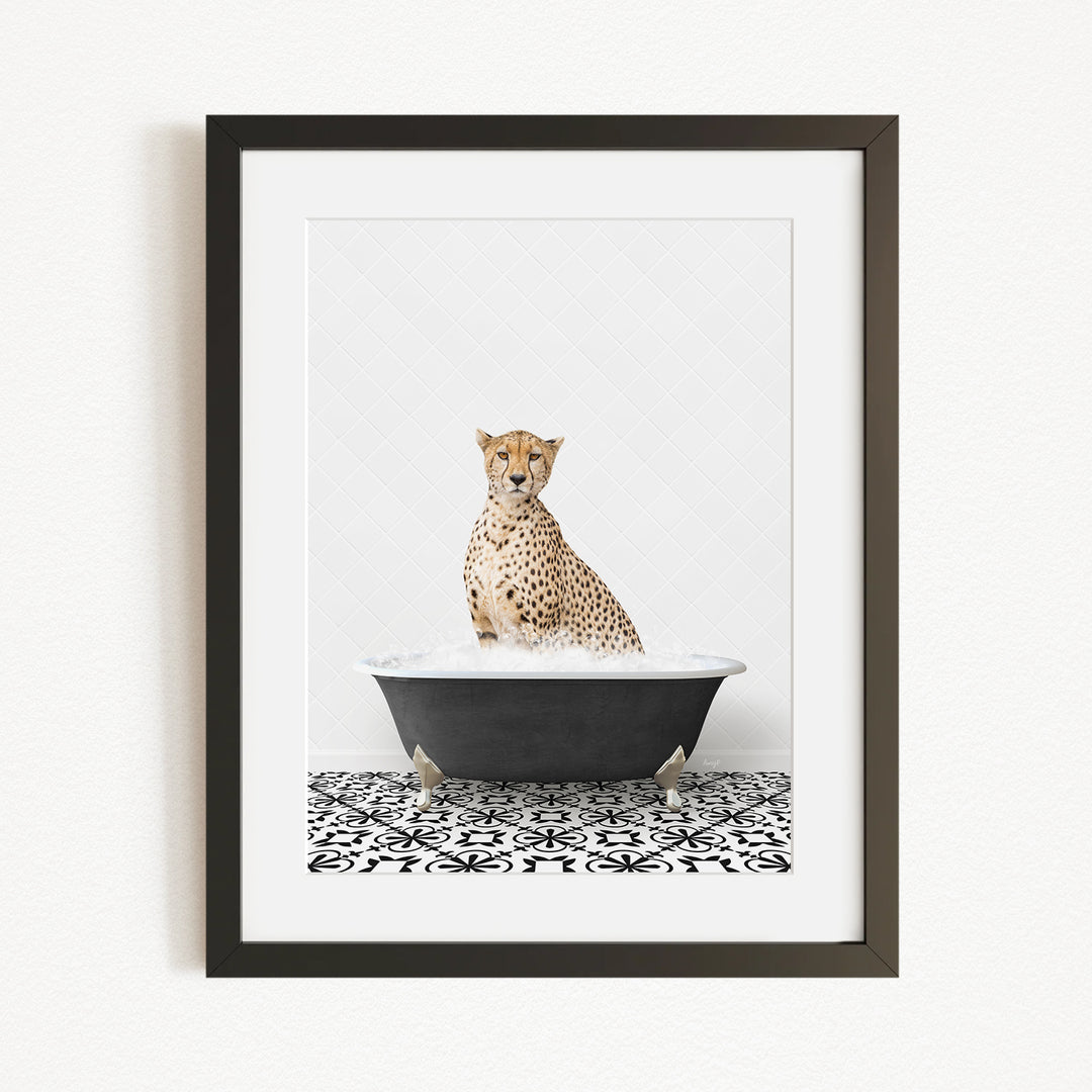 A cheetah sitting in a bathtub filled with water, surrounded by a black and white patterned floor.