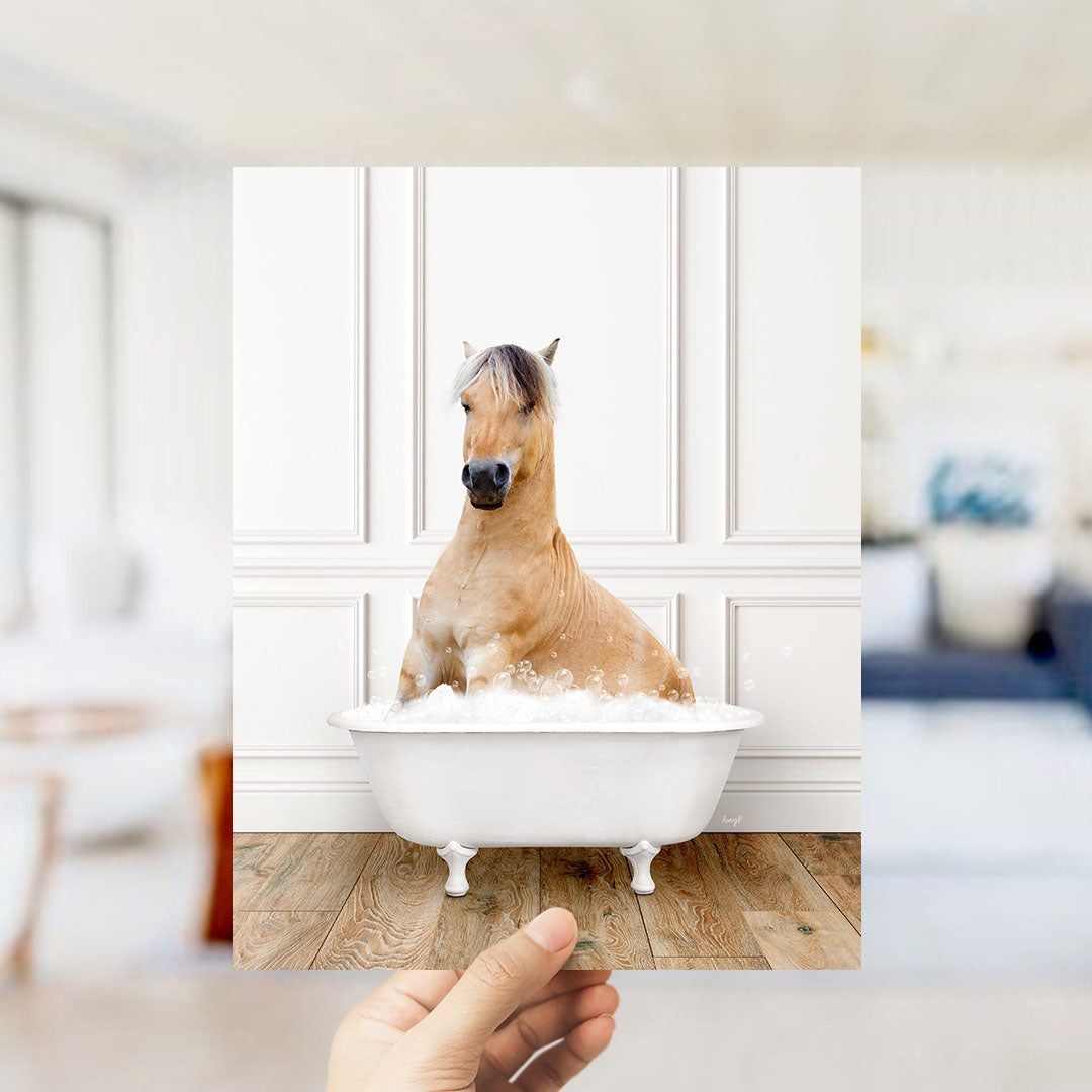 A brown horse sitting in a white bathtub filled with water, with a blurred background suggesting a bathroom setting.