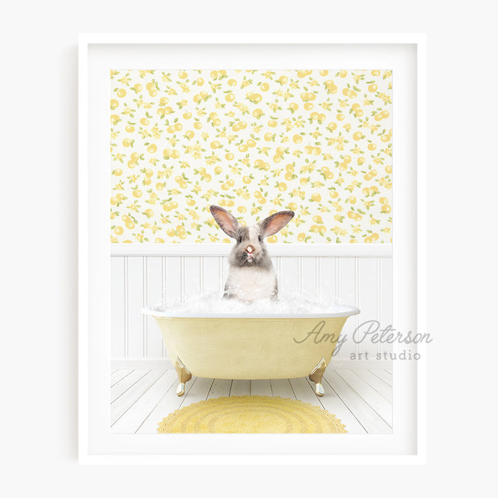 a rabbit sitting in a bathtub with a yellow rug