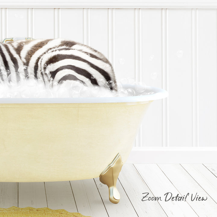 A zebra lying in a yellow bathtub filled with bubbles, with a white wall and wooden floor in the background.