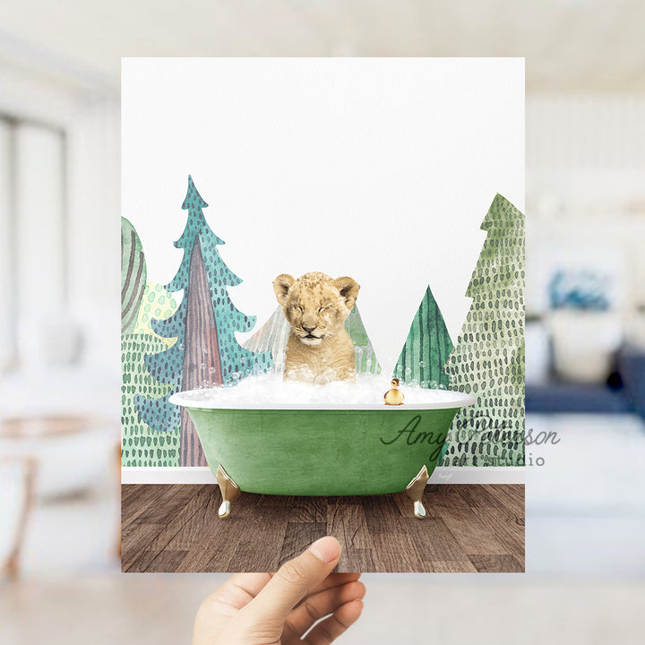 a hand holding up a card with a picture of a lion in a bathtub