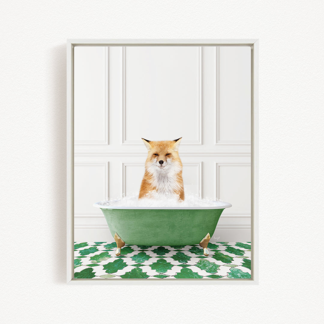 A red fox is sitting in a green bathtub filled with bubbles, looking directly at the camera.