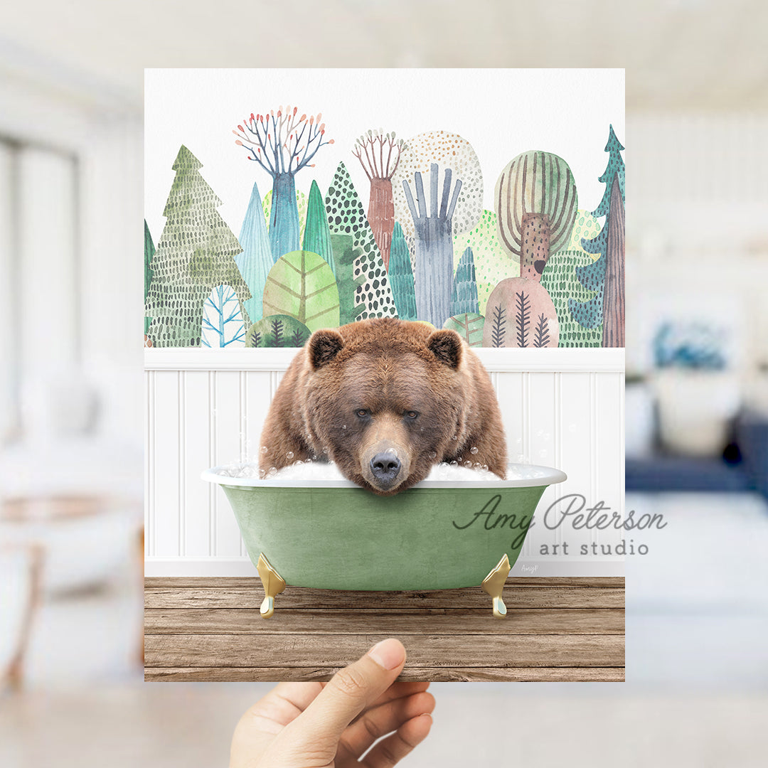 a hand holding up a card with a bear in a bathtub