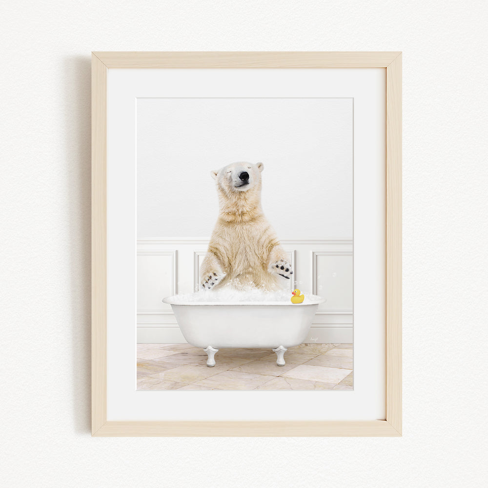 A polar bear standing in a white bathtub, with a yellow rubber duck floating in the water.