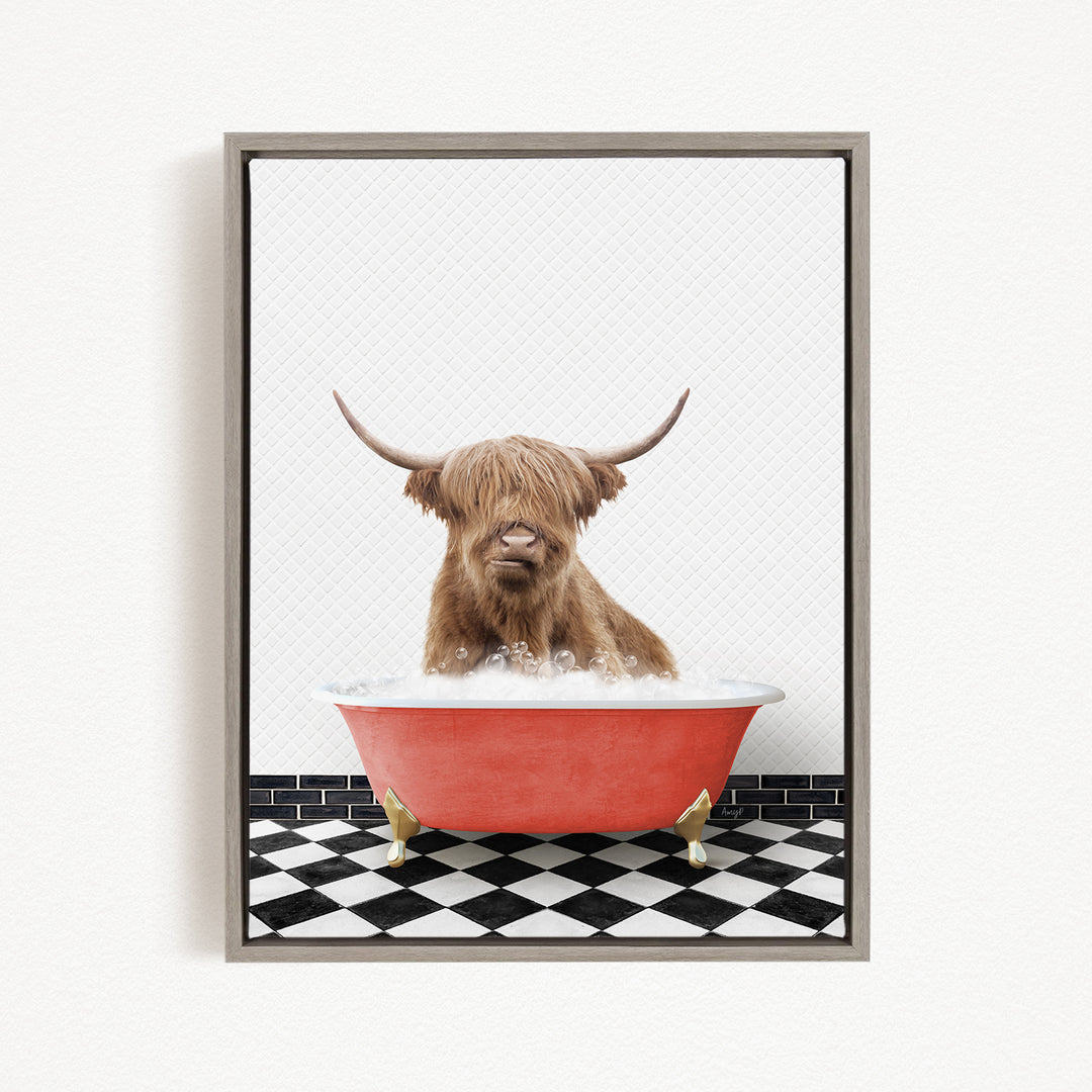 A Highland cow with shaggy horns is sitting in a red bathtub filled with bubbles, creating a whimsical and playful scene.