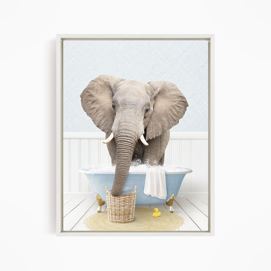 A gray elephant is standing in a blue bathtub filled with water, surrounded by rubber ducks.