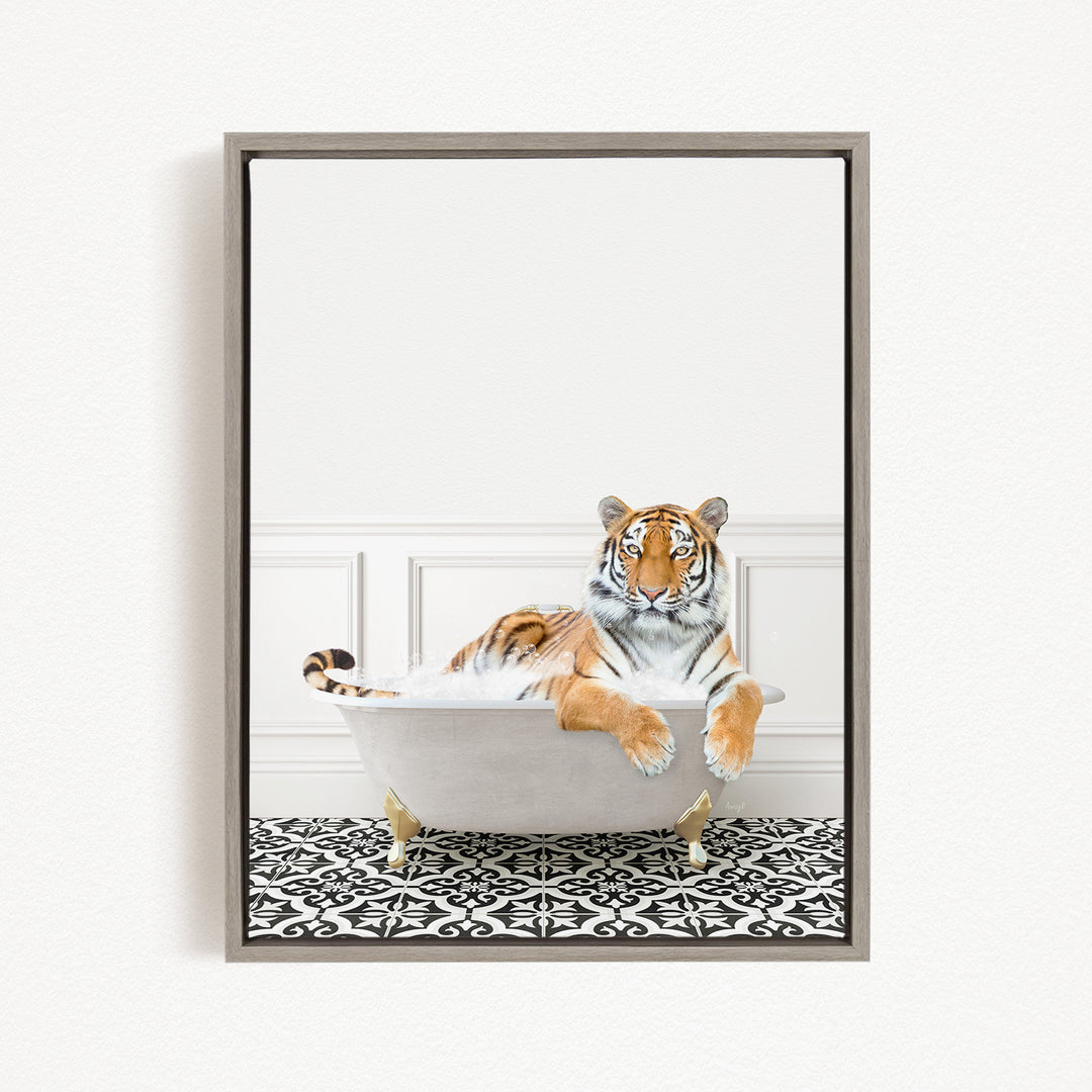 A tiger is sitting in a white bathtub filled with water, surrounded by a black and white patterned floor.