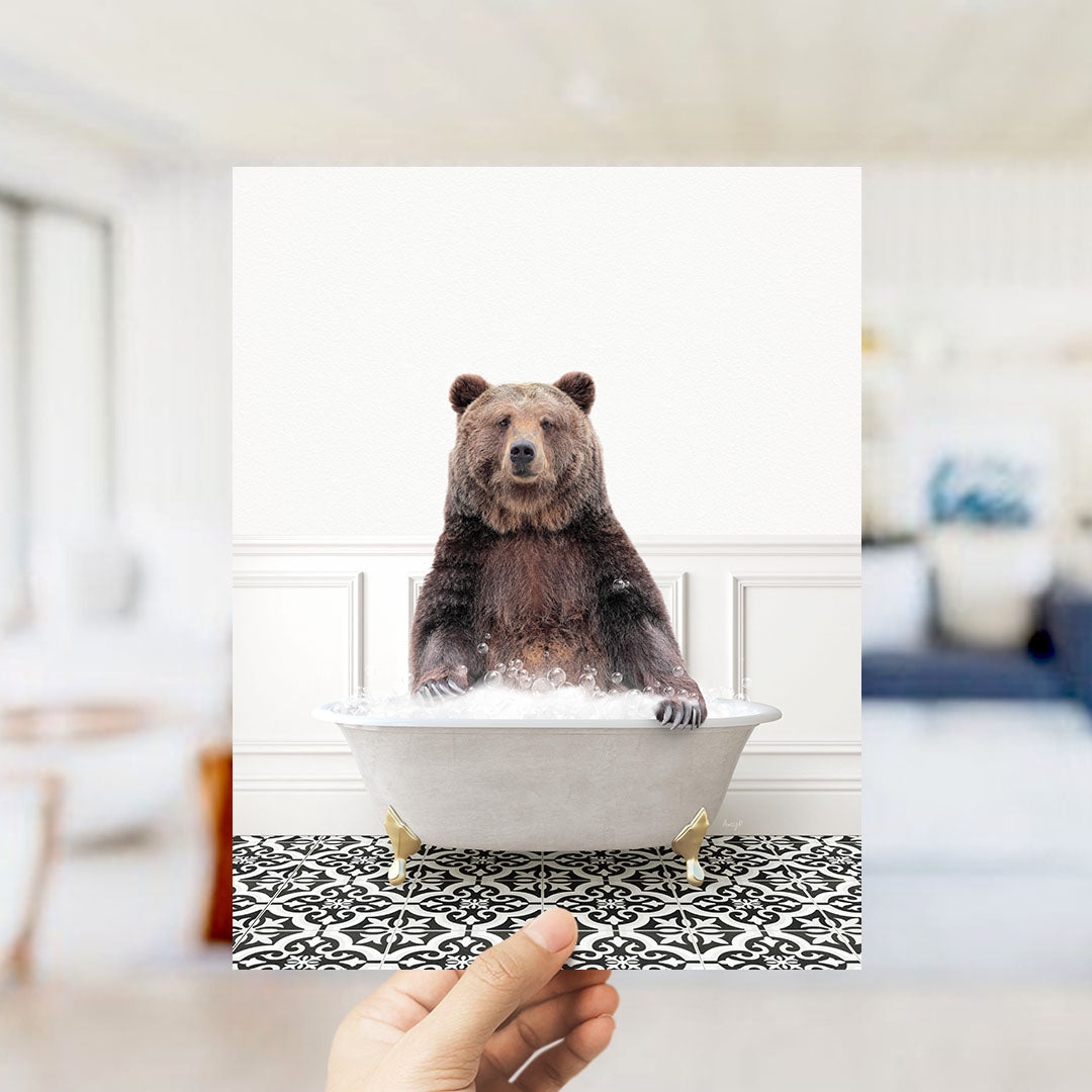 A brown bear sitting in a white bathtub filled with water, surrounded by a black and white patterned floor.