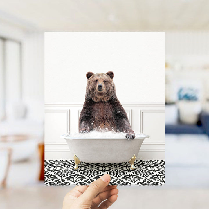 A brown bear sitting in a white bathtub filled with water, surrounded by a black and white patterned floor.