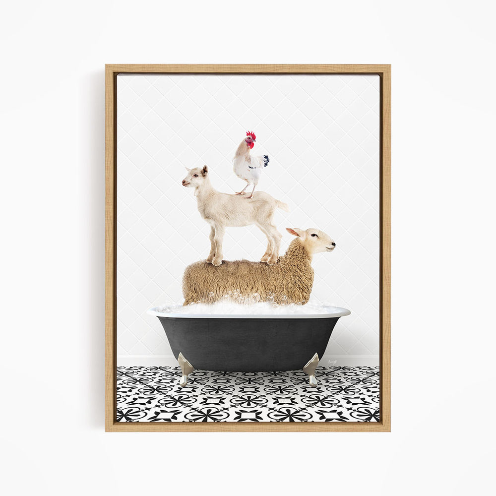A framed image depicting a sheep standing on a chicken's back while a lamb sits on a tub of water.