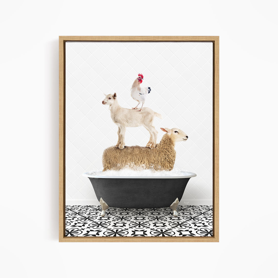 A framed image depicting a sheep standing on a chicken's back while a lamb sits on a tub of water.