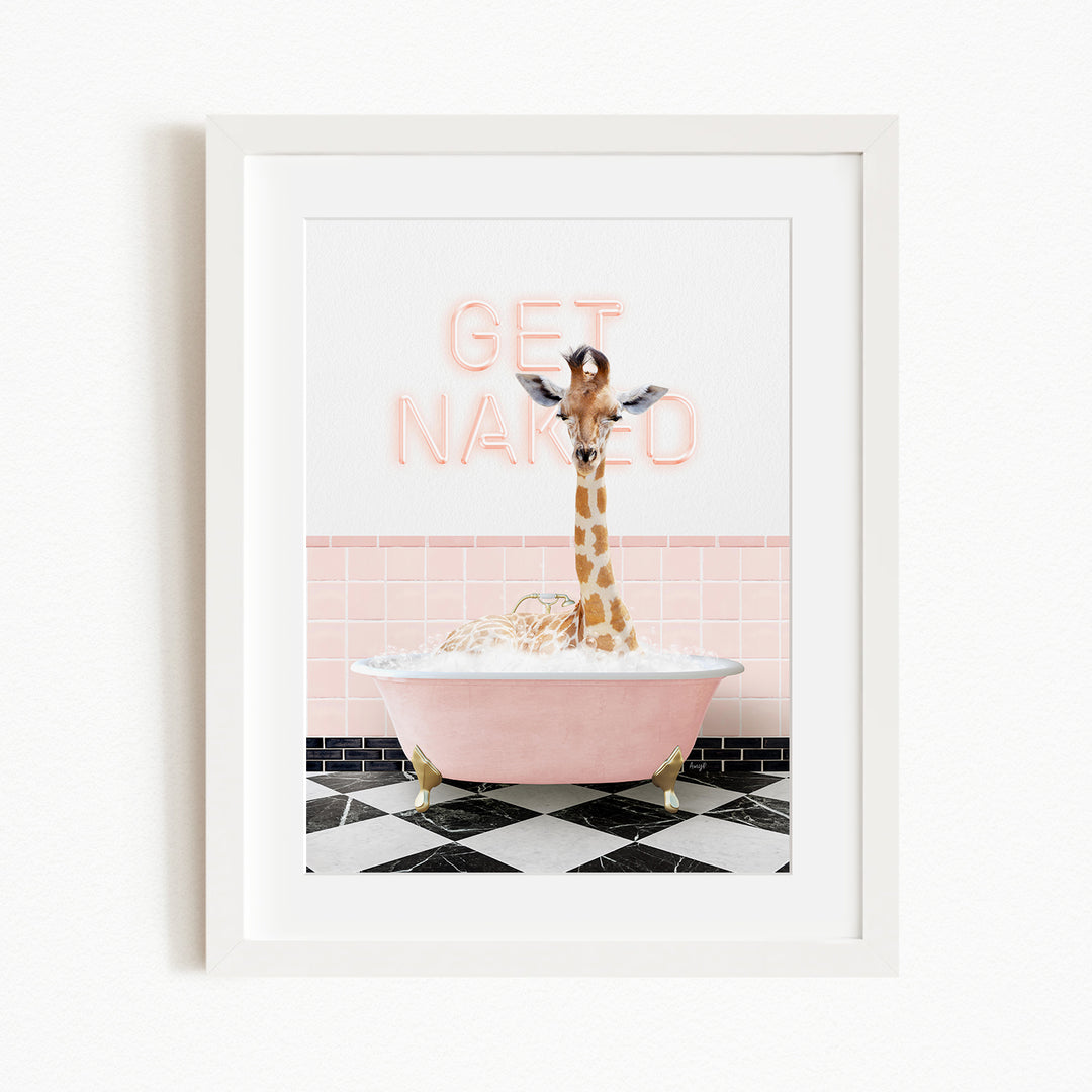 A giraffe standing in a pink bathtub with the words "GET NAKED" written on the wall behind it.