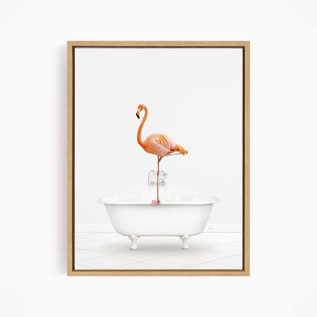 A pink flamingo standing on the edge of a white bathtub filled with water.