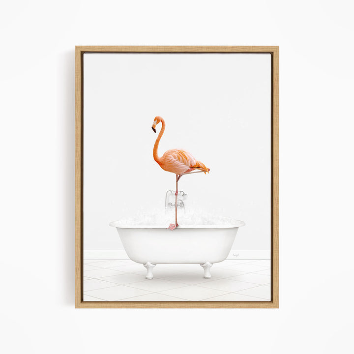 A pink flamingo standing on the edge of a white bathtub filled with water.