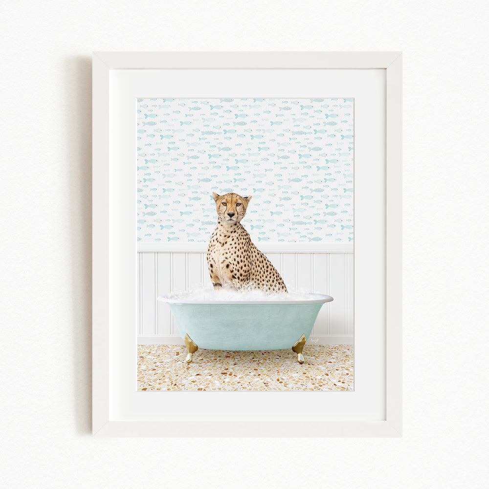 A cheetah sitting in a light blue bathtub filled with water, surrounded by a patterned wall.