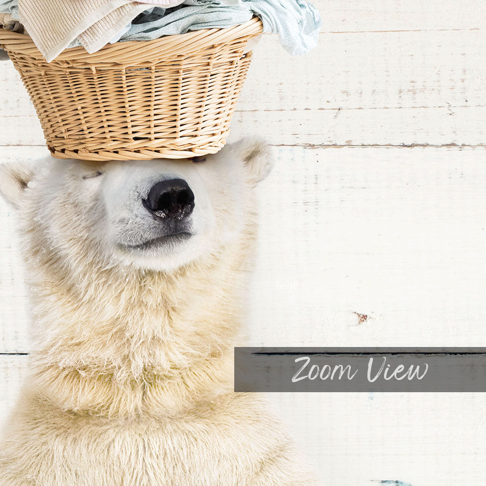 A polar bear is sitting on a wicker basket, with its head resting on the basket and its eyes closed.