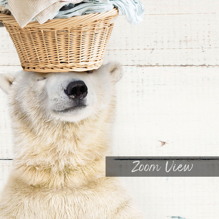 A polar bear is sitting on a wicker basket, with its head resting on the basket and its eyes closed.
