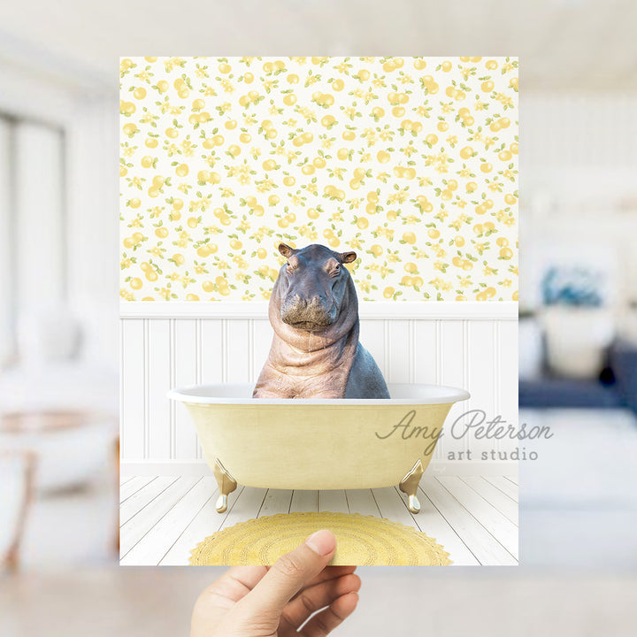 a hippo sitting in a bathtub with a yellow wallpaper behind it