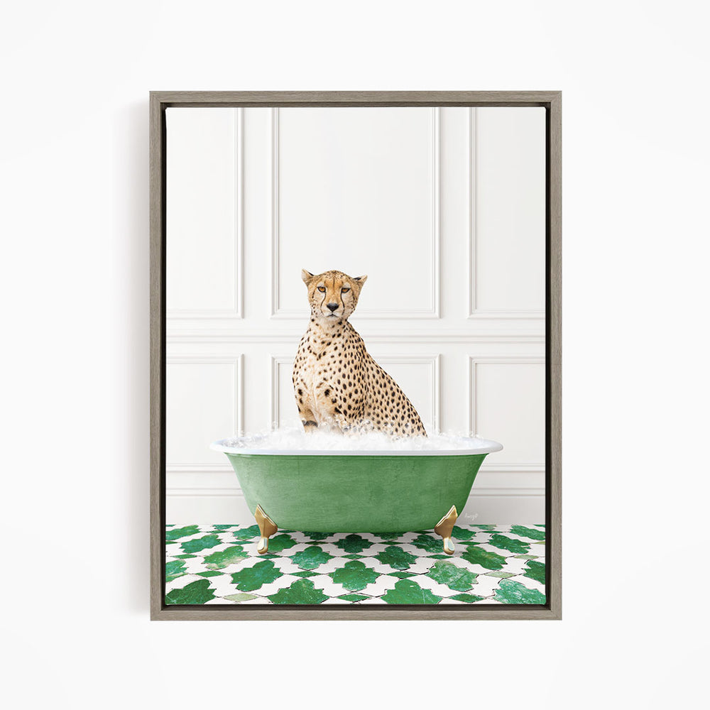 A cheetah sitting in a green bathtub filled with water, surrounded by a green and white patterned floor.