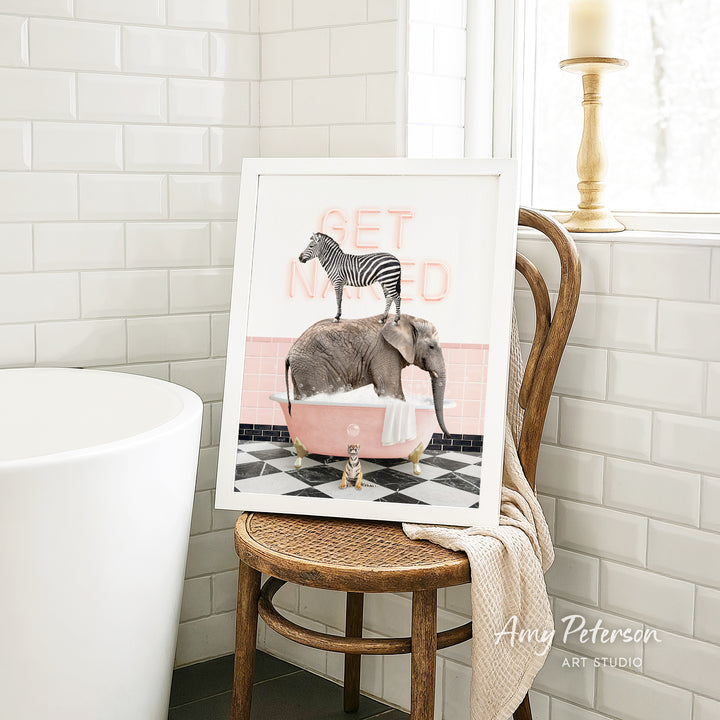 A framed image of a zebra standing on an elephant in a pink bathtub, with the words "GET NAMED" written on the side of the bathtub.