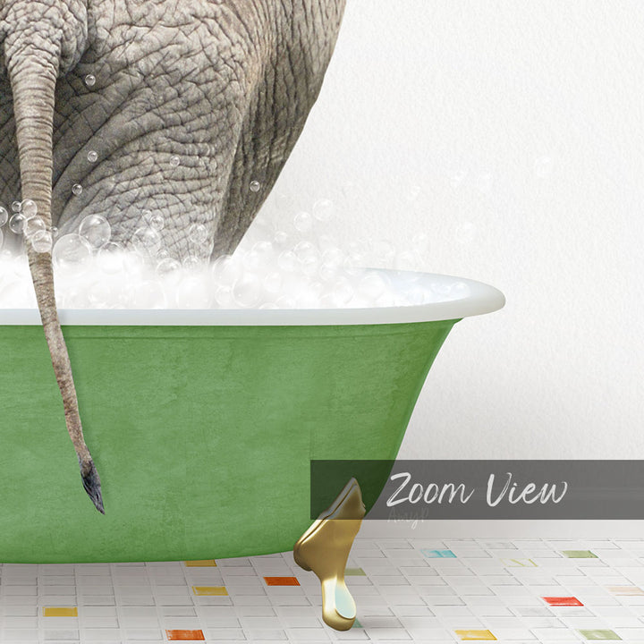 A large elephant is standing in a green bathtub filled with bubbles, with its tail hanging over the side of the tub.