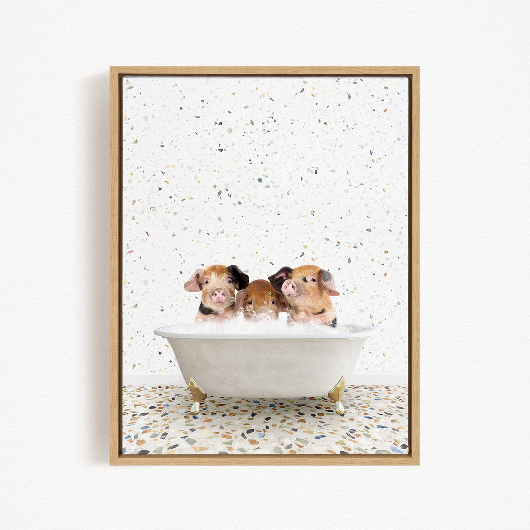 Three adorable pigs sitting in a white bathtub, enjoying a relaxing bath.