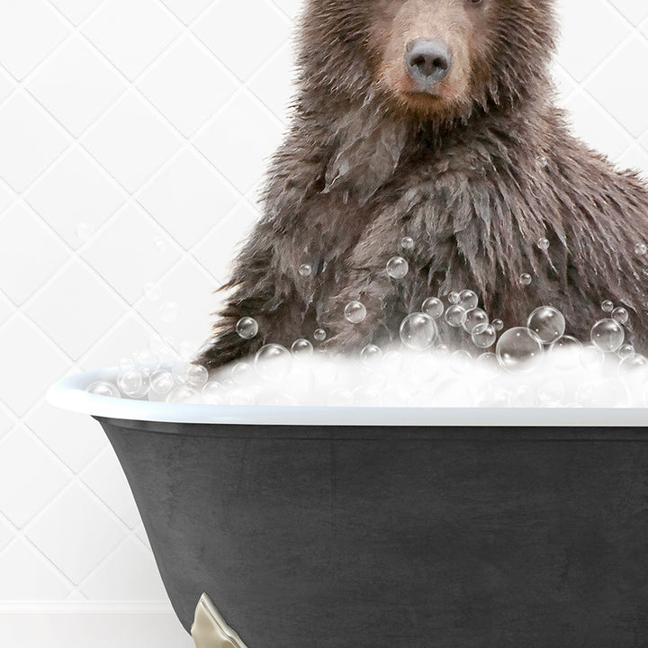 a bear is sitting in a bathtub with bubbles