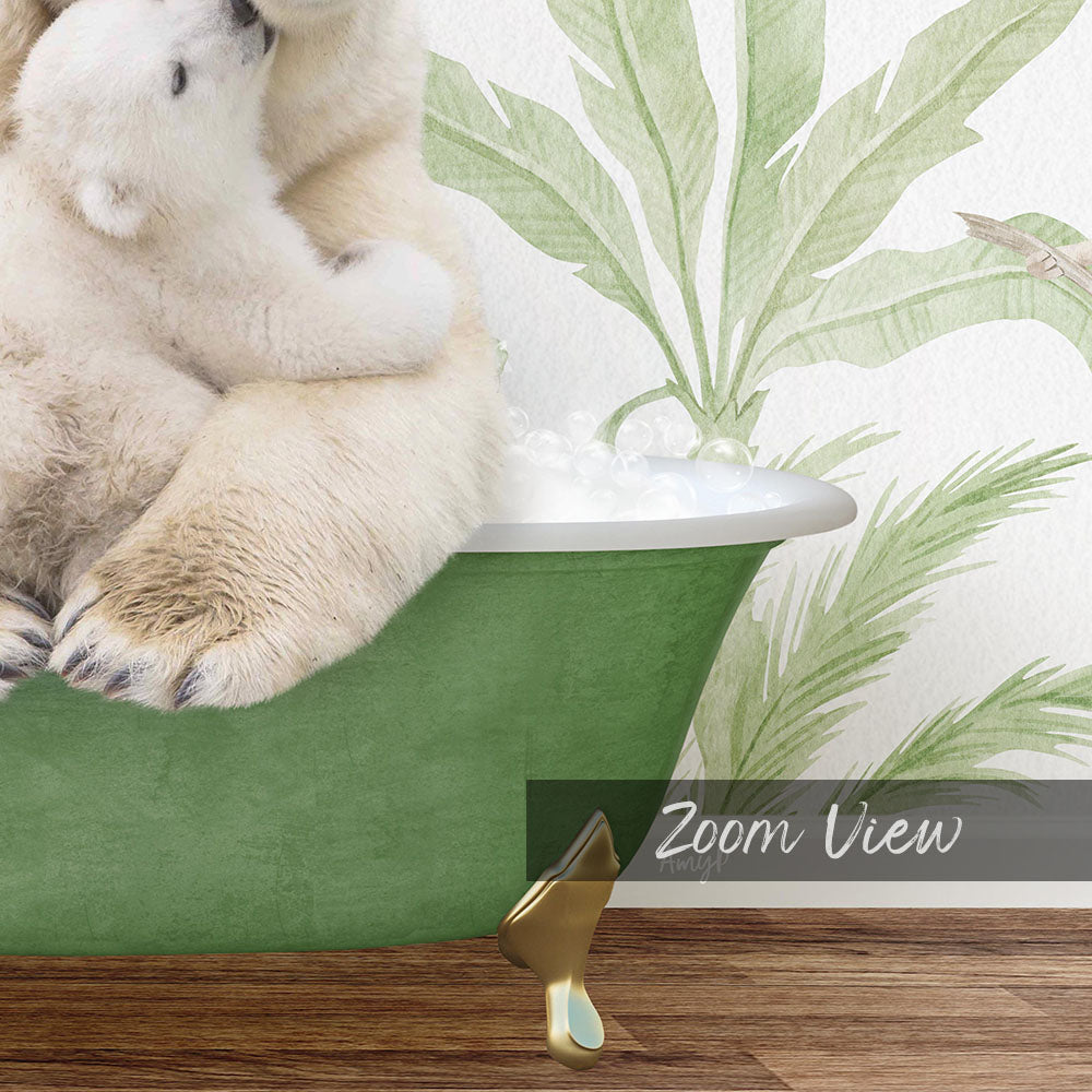 A polar bear cub sitting in a green bathtub, with a palm tree wallpaper in the background.