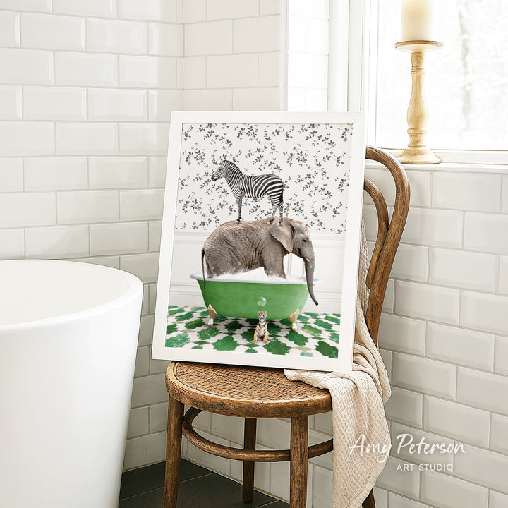 A framed image of a zebra standing on an elephant's back while the elephant is in a green bathtub, surrounded by a floral pattern.