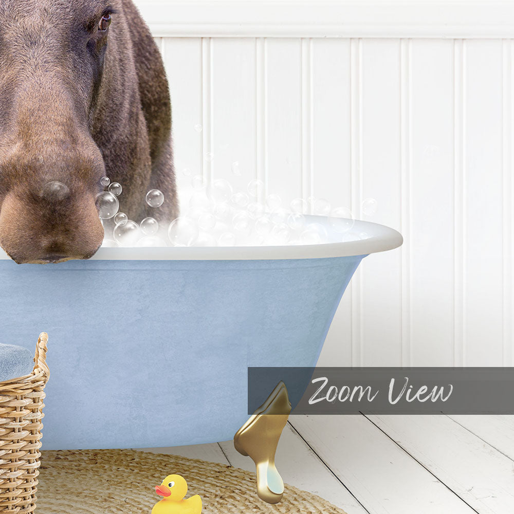 A dog is standing in a blue bathtub filled with bubbles, with a yellow rubber duck nearby.