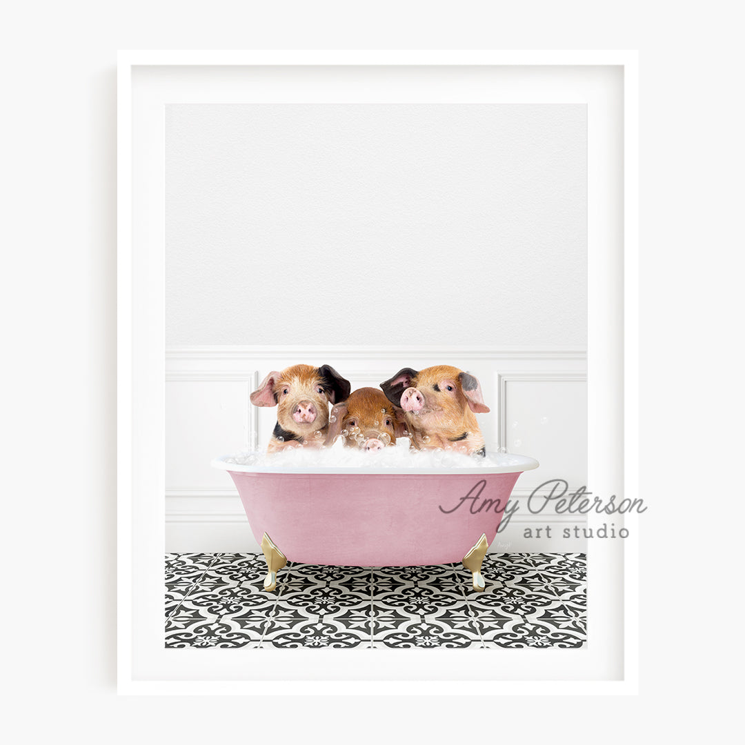 a group of three hamsters in a pink bathtub