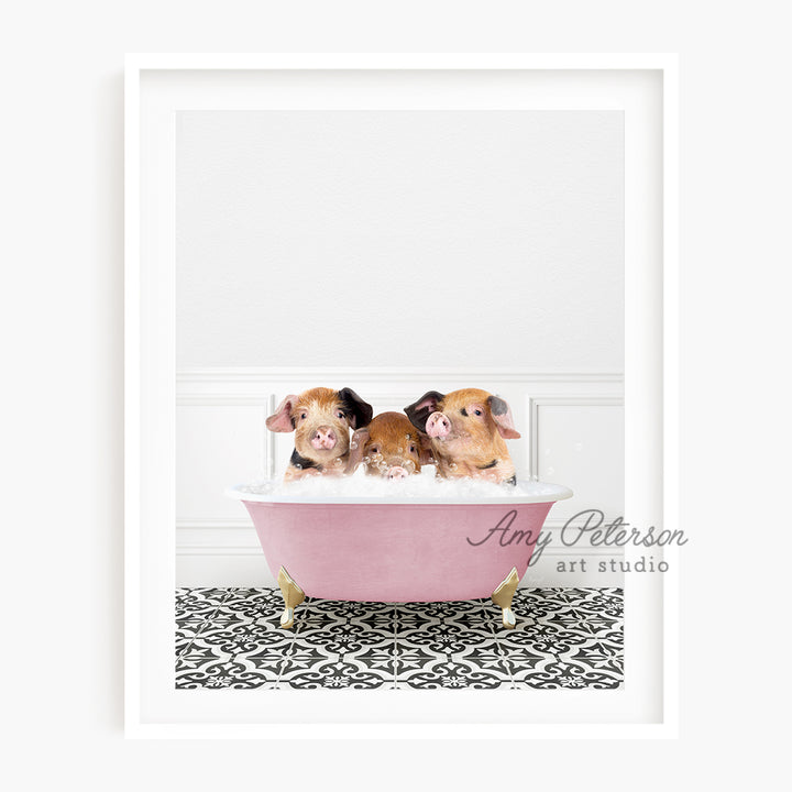 a group of three hamsters in a pink bathtub