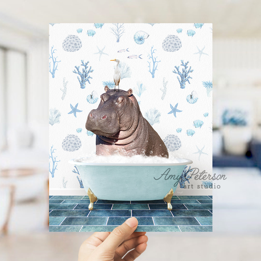 a hippopotamus in a bathtub with a blue wallpaper behind it