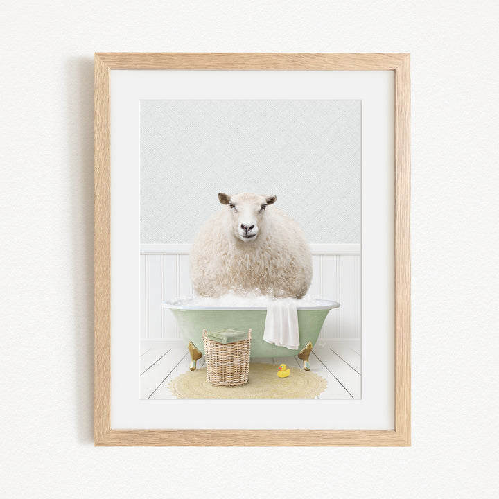 A fluffy white sheep sits in a green bathtub, surrounded by a basket of toys and a yellow rubber duck, in a serene and whimsical bathroom scene.