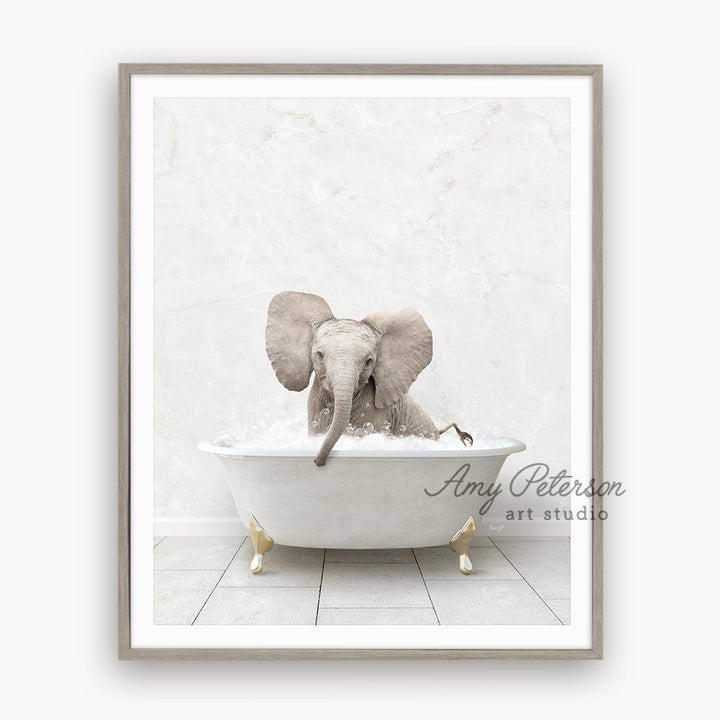 an elephant taking a bath in a bathtub