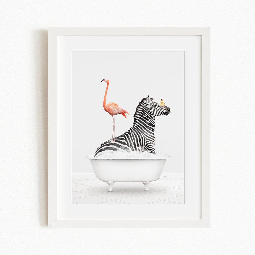 A framed image depicting a zebra sitting in a bathtub, with a flamingo standing on its back and a bird perched on its head.