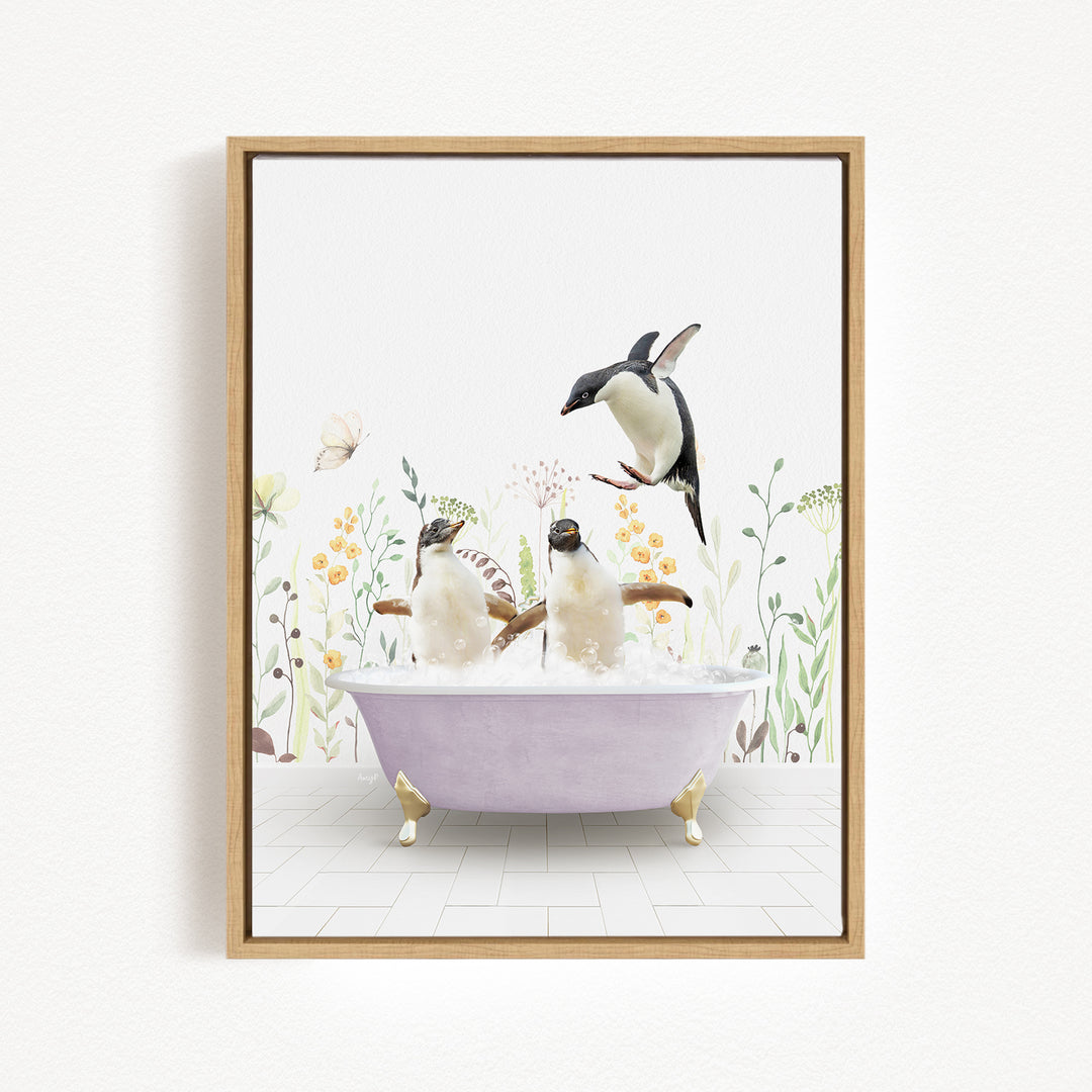 A framed illustration depicting two penguins sitting in a bathtub filled with bubbles, surrounded by flowers and plants.