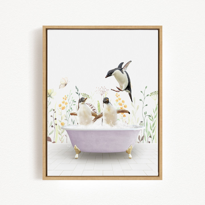 A framed illustration depicting two penguins sitting in a bathtub filled with bubbles, surrounded by flowers and plants.
