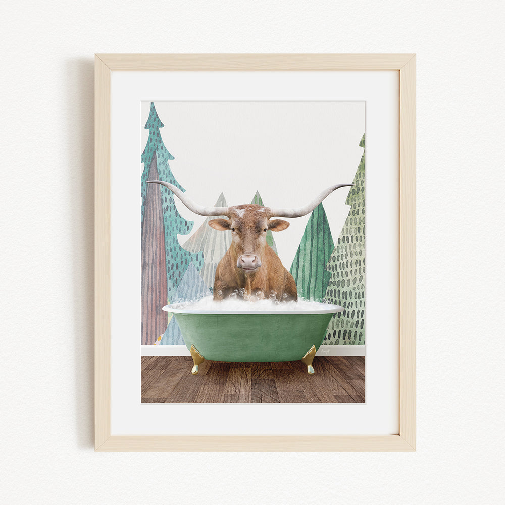 A brown cow with large horns is sitting in a green bathtub, surrounded by a forest scene with pine trees and a snowy landscape.