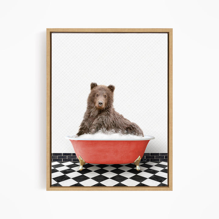 A brown bear sitting in a red bathtub filled with water, surrounded by a black and white checkered floor.