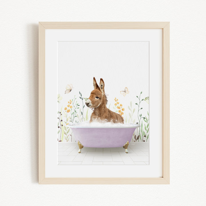A brown rabbit sitting in a purple bathtub filled with bubbles, surrounded by flowers and butterflies.