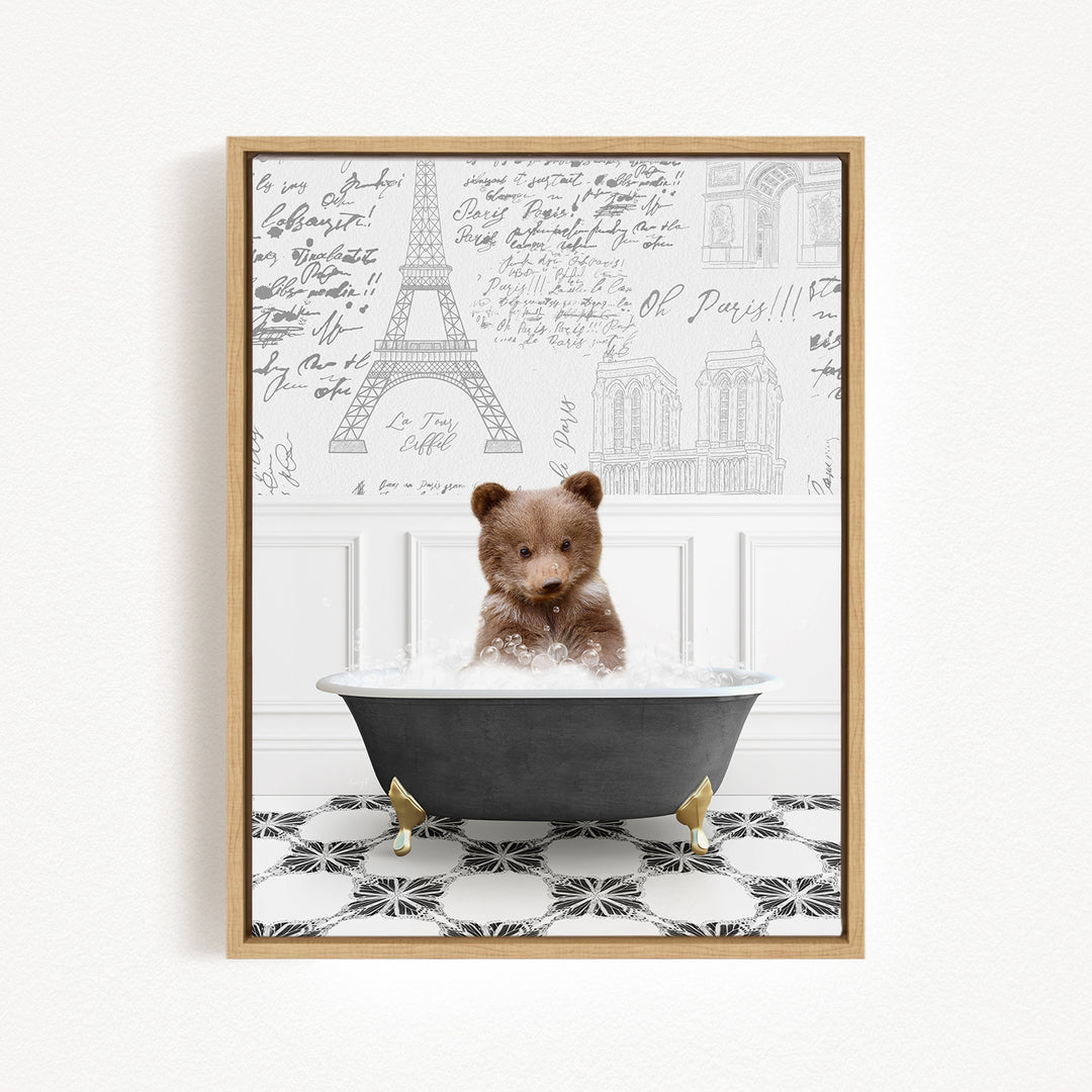 A teddy bear sitting in a bathtub filled with bubbles, surrounded by a Paris-themed background with the Eiffel Tower and other Parisian landmarks.