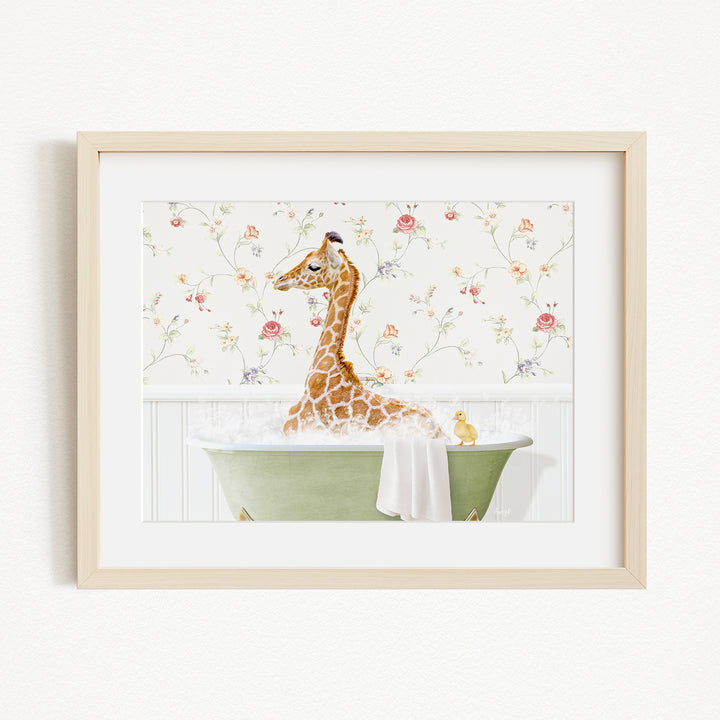A giraffe sitting in a green bathtub filled with water, surrounded by a floral wallpaper.