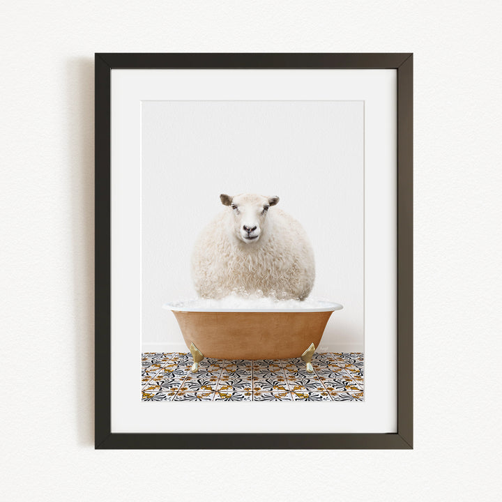 A fluffy white sheep sits in a brown bathtub filled with bubbles, surrounded by a patterned tile floor.